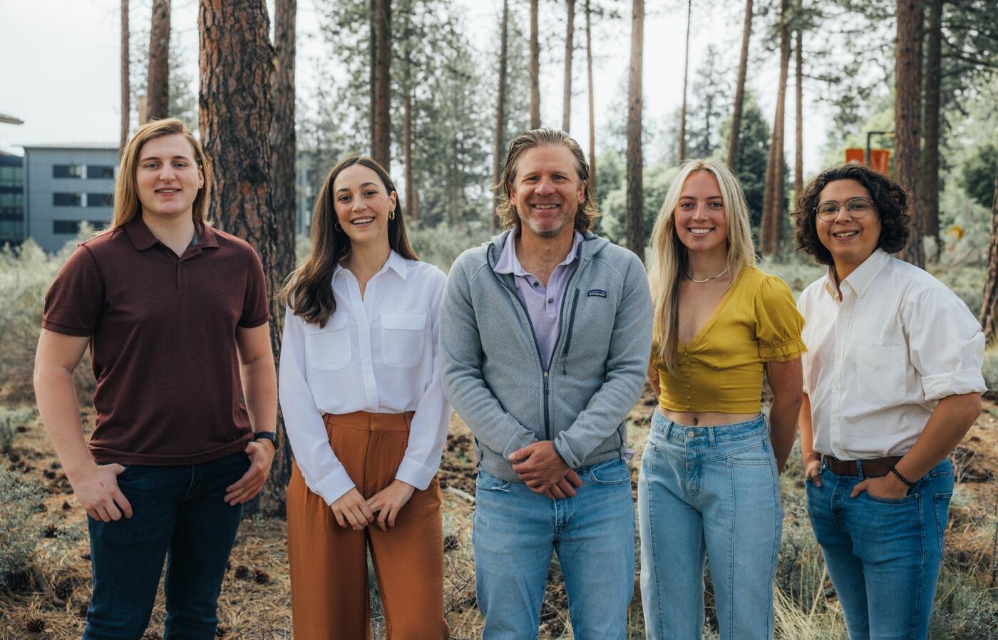 Group of people standing in a row