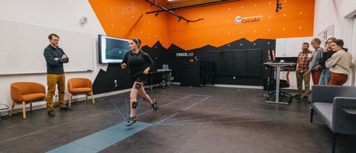 Person running on an indoor mat