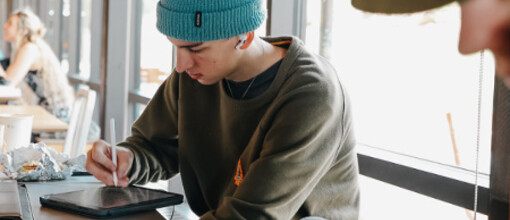 OSU student on tablet