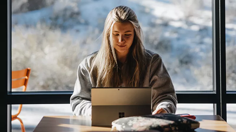Student works on a computer