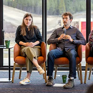 OSU-Cascade students sitting with a microphone