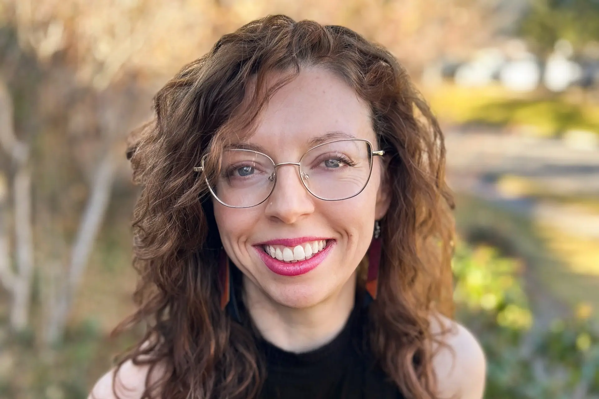 Headshot of a woman with glasses