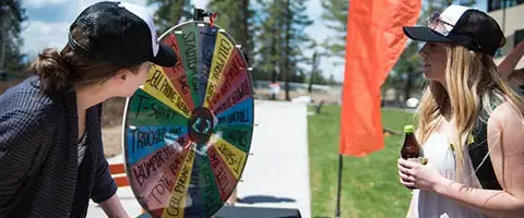 Students playing the spinning wheel game