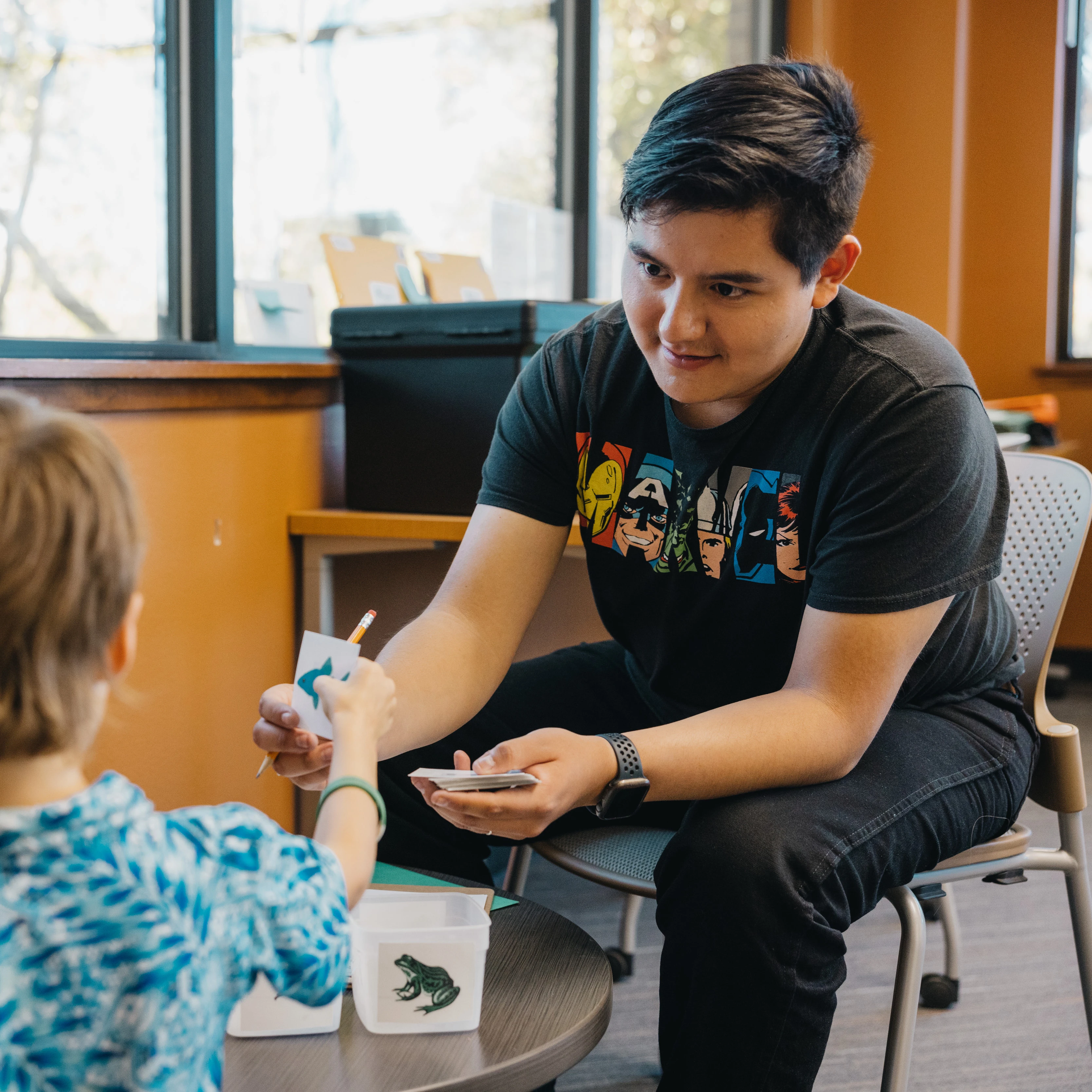 Student working with child
