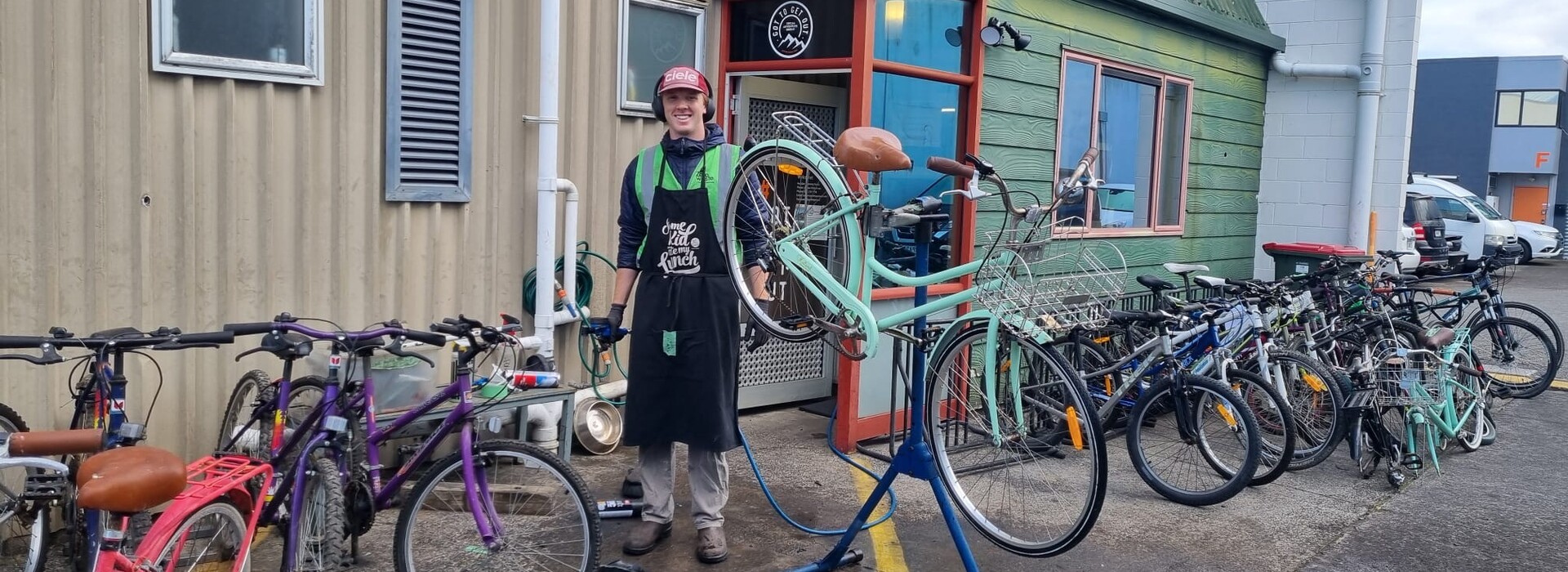 Anders holding a bike at his internship