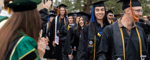 OSU-Cascades grads smiling while walking