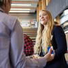 Female student with employer at career fair