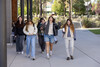 A group of students walk outside a building at OSU-Cascades