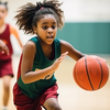 young girl in team uniform, dribbling basketball