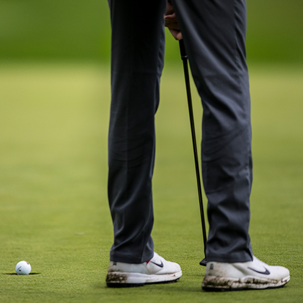 Person on course with putter