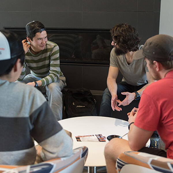 Students talking in cafe